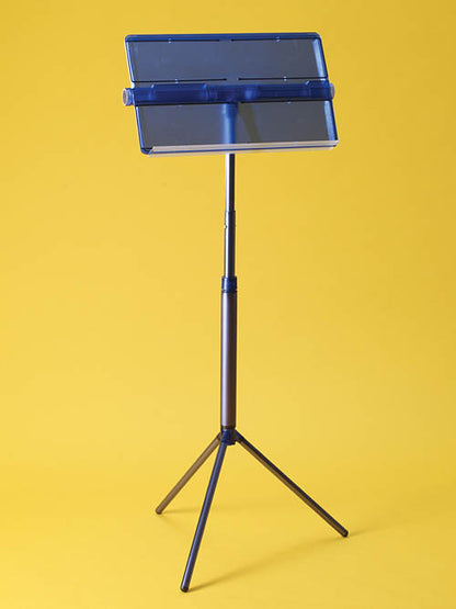 Blue folding desk and tripod music stand on a yellow background